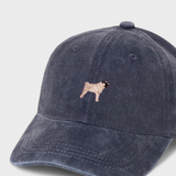 Navy washed cotton baseball cap with embroidered hand-drawn pug design, personalised embroidery option on the back.