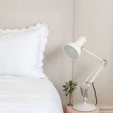 Organic cotton pillowcase with blush pink scalloped edge, ideal for toddlers.