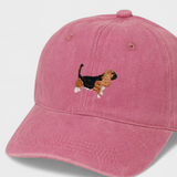 Pink baseball hat with embroidered Basset Hound design on front, personalised embroidery option on back, made of 100% washed cotton.