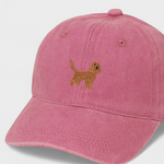 Pink baseball cap with embroidered brown Cocker Spaniel design on front, personalised embroidery option on back, made from 100% washed cotton.