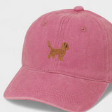 Pink baseball cap with embroidered brown Cocker Spaniel design on front, personalised embroidery option on back, made from 100% washed cotton.
