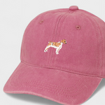 Pink Brittany Spaniel personalised hat with embroidered dog design and custom back embroidery in cotton baseball style