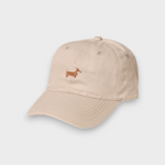 Beige Corgi personalised hat with embroidered hand-drawn Corgi design on front, made of 100% washed cotton in classic baseball fit