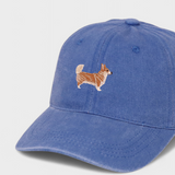 Blue baseball cap featuring an embroidered hand-drawn Corgi design, customizable with personalized embroidery on the back.