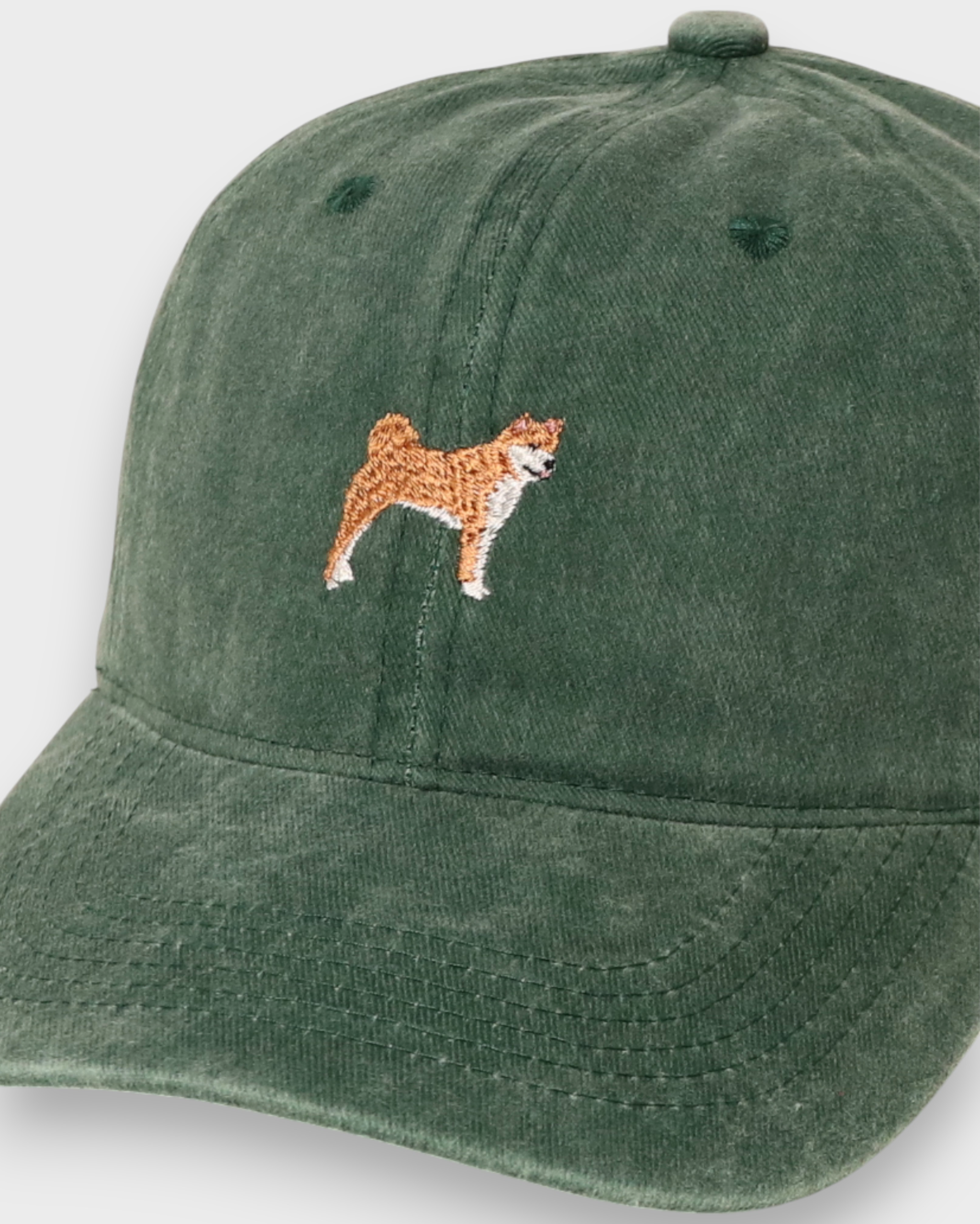 Shiba Inu personalised hat with hand-drawn embroidery design on front, made of washed cotton.