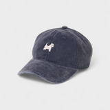 Navy blue personalised hat with embroidered West Highland White Terrier design on front and customizable embroidery on back, made of 100% washed cotton.
