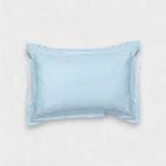 Toddler pillowcase blue with embroidered flange edge and customizable design.