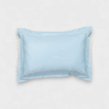 Toddler pillowcase blue with embroidered flange edge and customizable design.