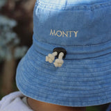 Blue embroidered Shells personalised bucket hat with adjustable cord for kids aged 2-6 years