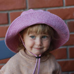 Customised pink bucket hat for kids made of 100% washed cotton.